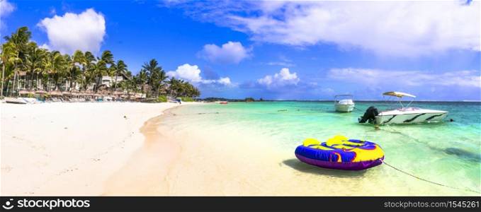 Splendid beaches of Mauritius island. Belle mare beach with water sport activities. tropical vacation - splendid beaches of Mauritius