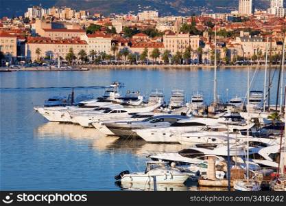 Split cityscape on the Adriatic Sea in Croatia, Dalmatia region, luxury motorboat harbour in the foreground
