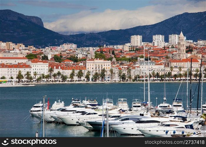 Split cityscape on the Adriatic Sea in Croatia, motorboat harbor in the foreground
