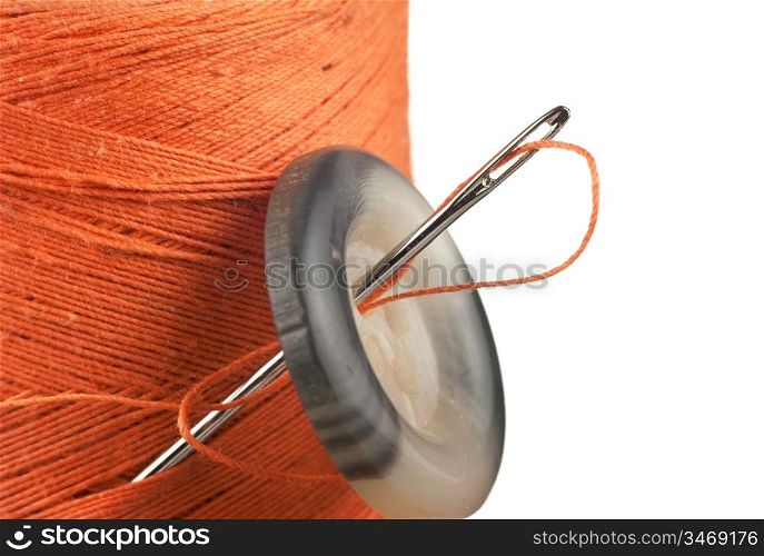 spool of thread and buttons isolated on white background