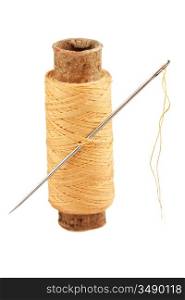 spool of thread and needle isolated on a white background