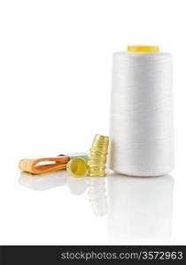 spool of thread with timbles and tapeline