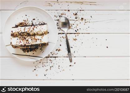 spoon near piece cake