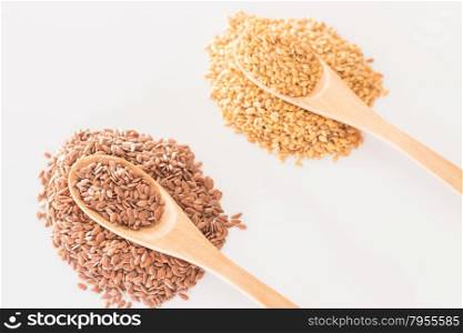 Spoon of flax seed on clean kitchen table, stock photo