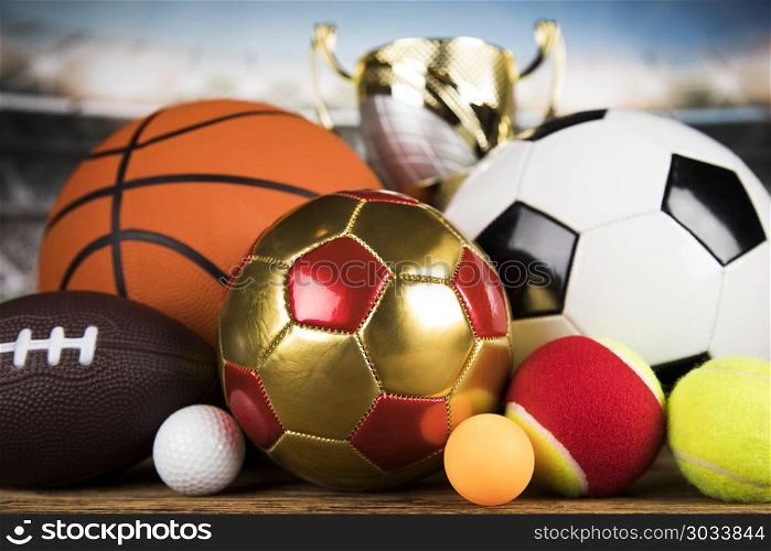 Sport, a lot of balls and stuff . Cups of winners award, Sport equipment and balls