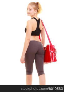 Sport and active lifestyle. Back of fitness sporty girl in sportswear with red gym bag isolated on white.