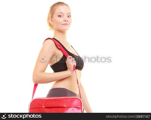 Sport and active lifestyle. Fitness sporty girl in sportswear with red gym bag isolated on white.