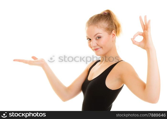 Sport and active lifestyle. Fitness sporty girl showing ok okay hand sign gesture empty palm isolated