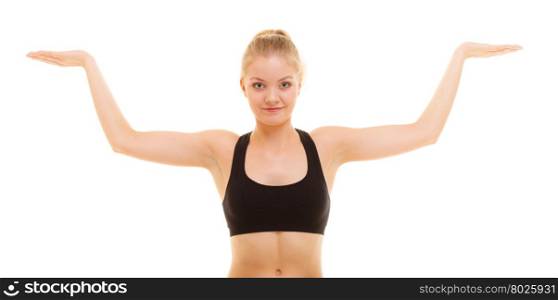 Sport and active lifestyle. fitness sporty girl stretching showing open hands palm with blank copy space for product or text isolated.