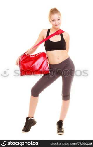 Sport and active lifestyle. Full length of fitness sporty girl in sportswear with red gym bag isolated on white.