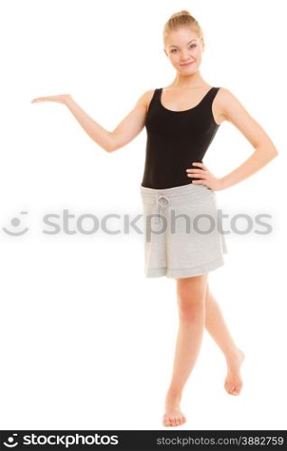 Sport and active lifestyle. Full length of fitness sporty girl showing open hand palm with blank copy space for product or text isolated on white.