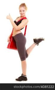Sport and active lifestyle. Full length of fitness sporty girl with red gym bag showing thumb up hand gesture isolated on white.