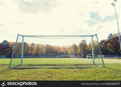 sport and equipment concept - football goal on field. football goal on field