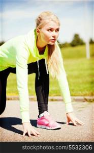 sport and lifestyle concept - woman doing running outdoors