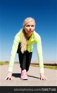 sport and lifestyle concept - woman doing running outdoors. woman doing running outdoors