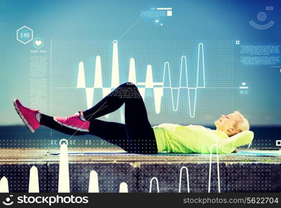 sport and lifestyle concept - woman doing sports outdoors