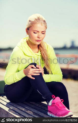 sport and lifestyle concept - woman doing sports outdoors