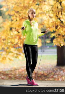 sport and lifestyle concept - woman doing sports outdoors. woman doing sports outdoors