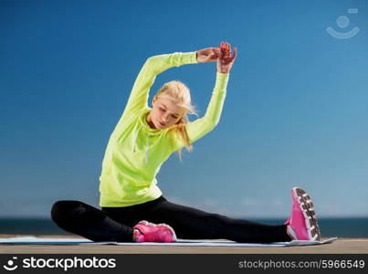 sport and lifestyle concept - woman doing sports outdoors. woman doing sports outdoors