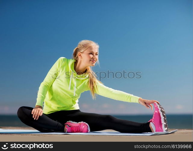 sport and lifestyle concept - woman doing sports outdoors. woman doing sports outdoors