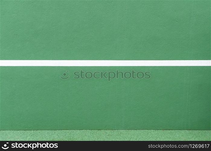 Sport background. Green wall and white line. Copy space