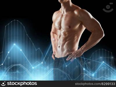 sport, bodybuilding, fitness and people concept - close up of young man or bodybuilder with bare torso over black background and diagram charts. close up of man or bodybuilder with bare torso