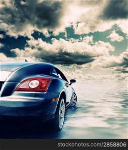 Sport car reflected in water