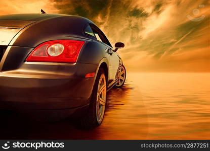Sport car reflected in water