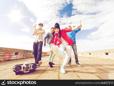 sport, dancing and urban culture concept - group of teenagers dancing