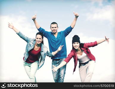 sport, dancing and urban culture concept - group of teenagers dancing