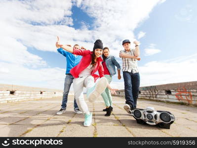 sport, dancing and urban culture concept - group of teenagers dancing