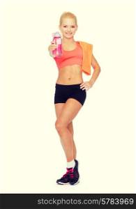 sport, excercise and healthcare - sporty woman with orange towel and water bottle