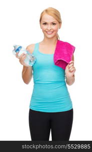sport, excercise and healthcare - sporty woman with pink towel and water bottle