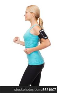 sport, excercise, technology, internet and healthcare - sporty woman running with smartphone