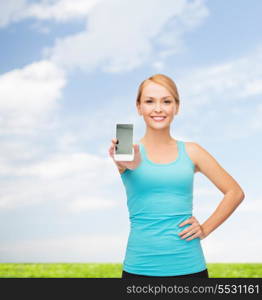 sport, excercise, technology, internet and healthcare - sporty woman with blank smartphone screen