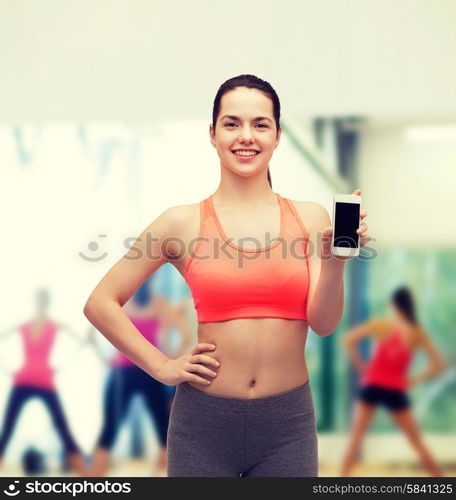 sport, excercise, technology, internet and healthcare - sporty woman with blank smartphone screen