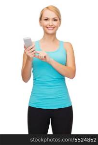sport, excercise, technology, internet and healthcare - sporty woman with smartphone