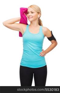 sport, excercise, technology, internet and healthcare - sporty woman with smartphone, earphones and towel