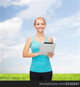 sport, excercise, technology, internet and healthcare - sporty woman with tablet pc