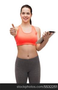 sport, excercise, technology, internet and healthcare - sporty woman with tablet pc computer showing thumbs up
