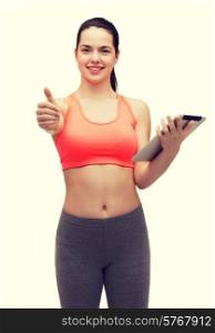sport, excercise, technology, internet and healthcare - sporty woman with tablet pc computer showing thumbs up