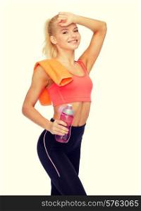 sport, exercise and healthcare - smiling sporty woman with orange towel and water bottle