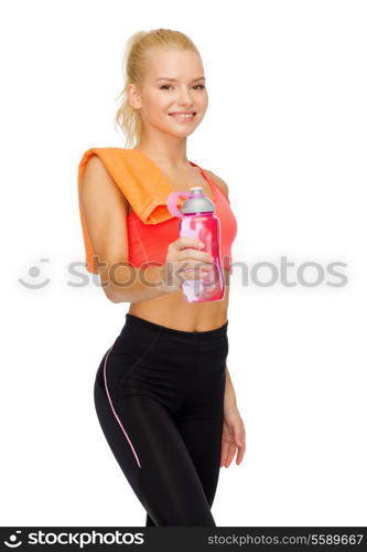 sport, exercise and healthcare - sporty woman with orange towel and water bottle