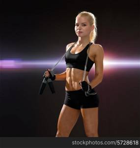 sport, exercise and healthcare - sporty woman with skipping rope