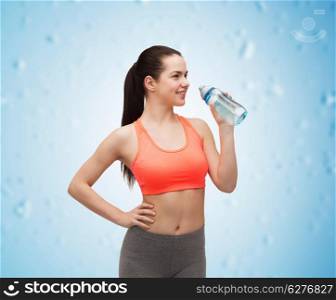 sport, exercise and healthcare - sporty woman with water bottle