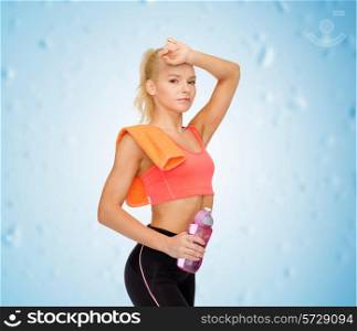 sport, exercise and healthcare - tired sporty woman with orange towel and water bottle
