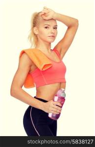 sport, exercise and healthcare - tired sporty woman with orange towel and water bottle