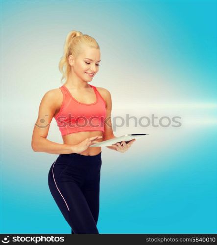 sport, exercise, technology, internet and healthcare concept - smiling sporty woman with tablet pc computer