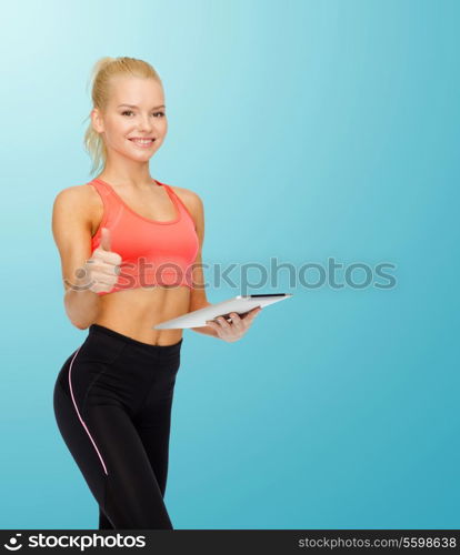 sport, exercise, technology, internet and healthcare - smiling sporty woman with tablet pc computer showing thumbs up