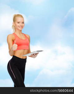 sport, exercise, technology, internet and healthcare - smiling sporty woman with tablet pc computer showing thumbs up